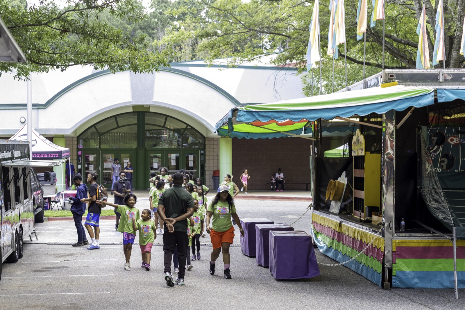 Families arriving at Welcome All Park for Turbo Day 2025