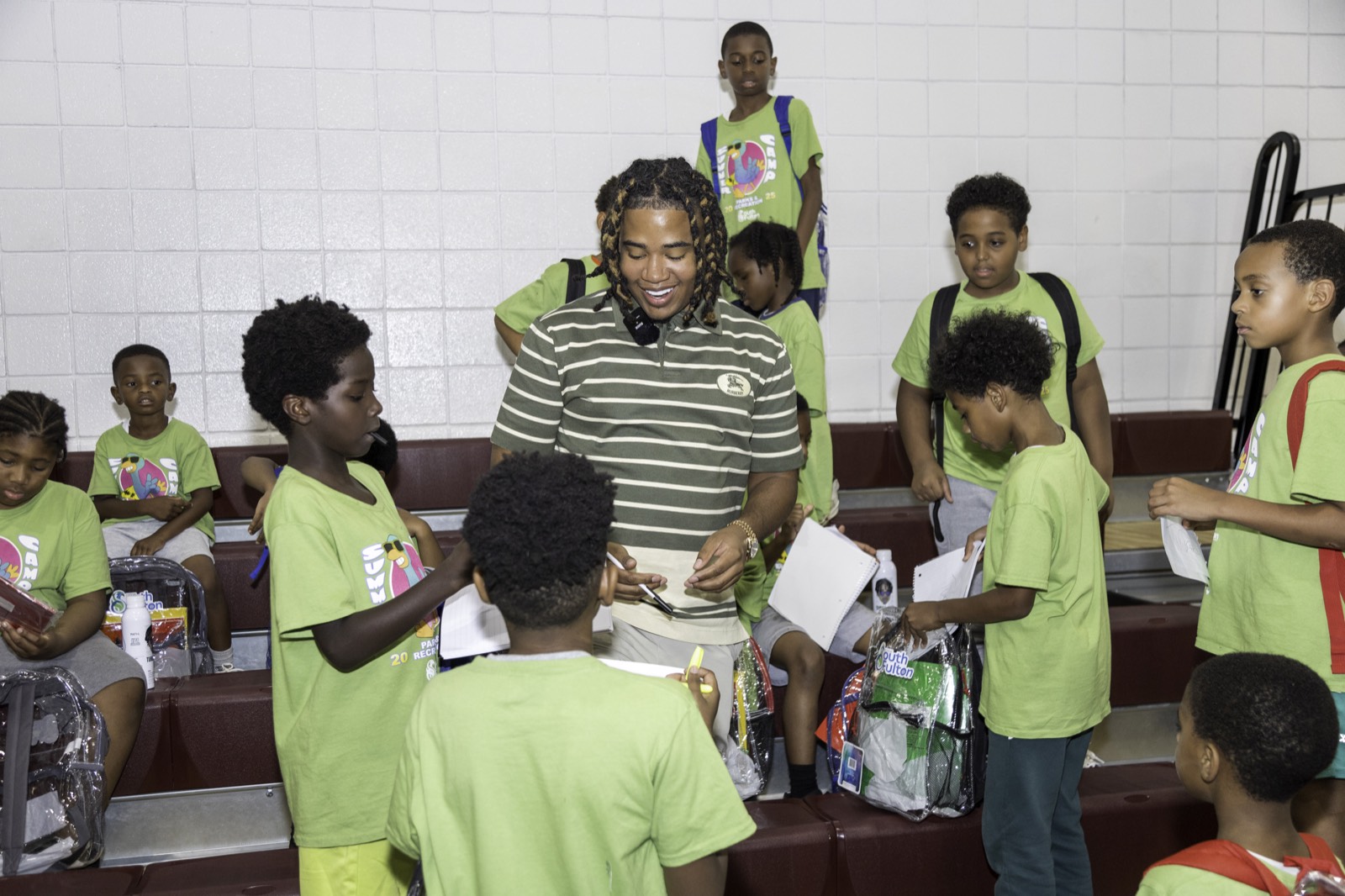 Turbo signing autographs for the kids at Turbo Day 2025