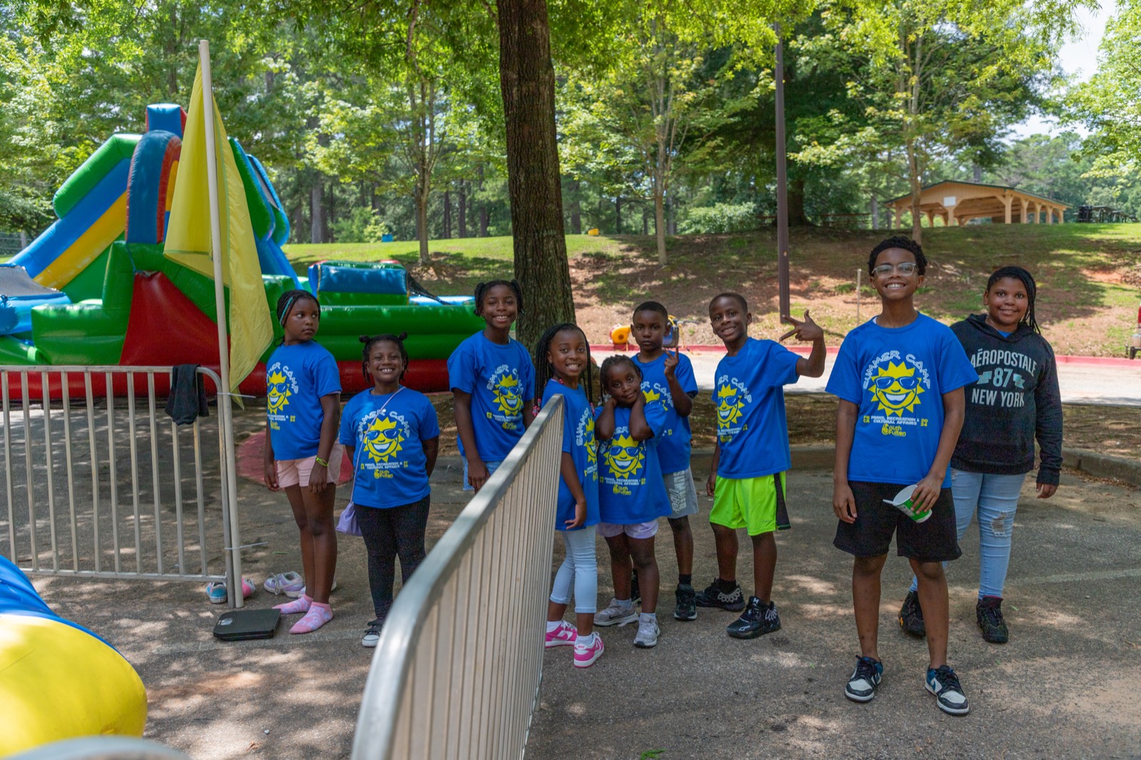 Kids in Turbo Day shirts at the carnival