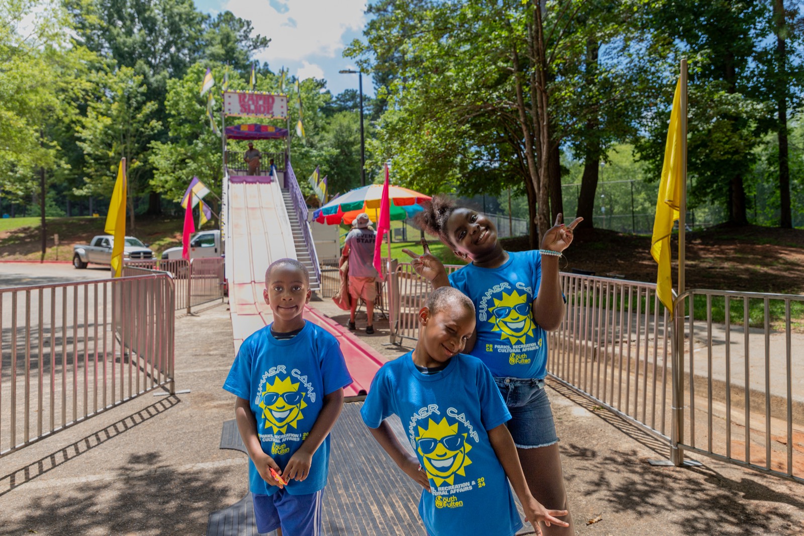 Kids smiling after the slide at Turbo Day