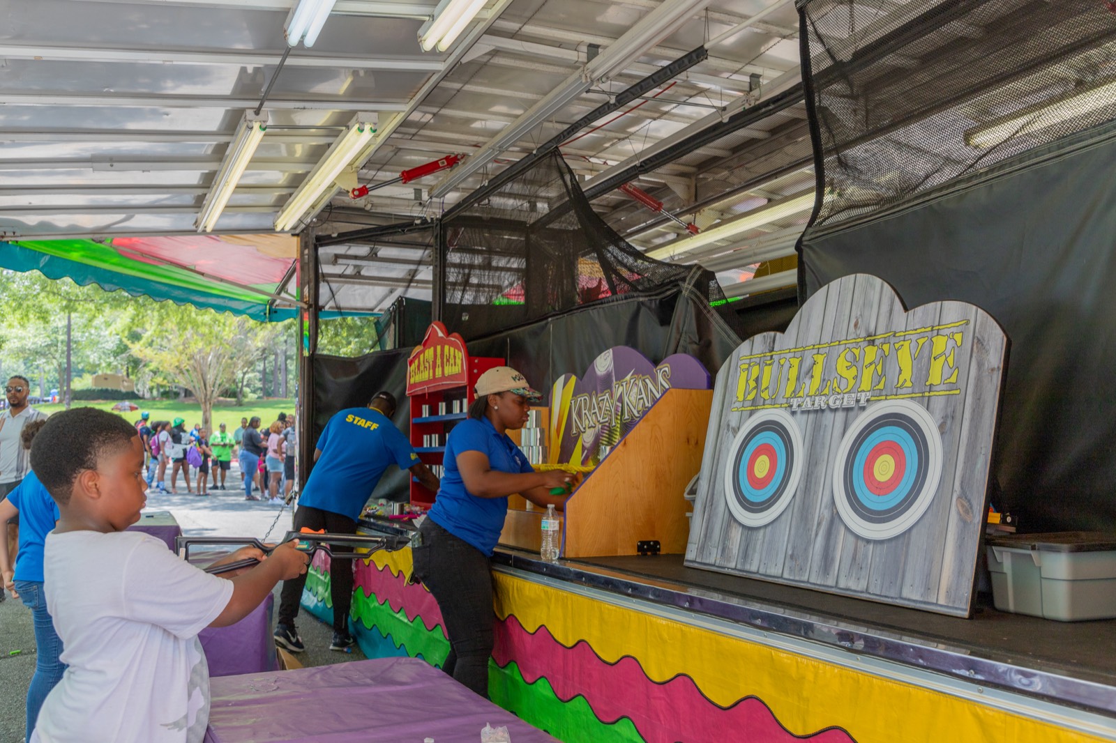 Kids playing carnival games at Turbo Day