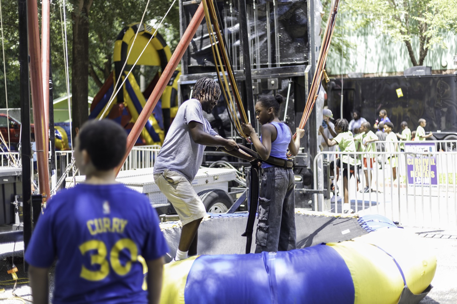 Kids on the bungee jump at Turbo Day 2025