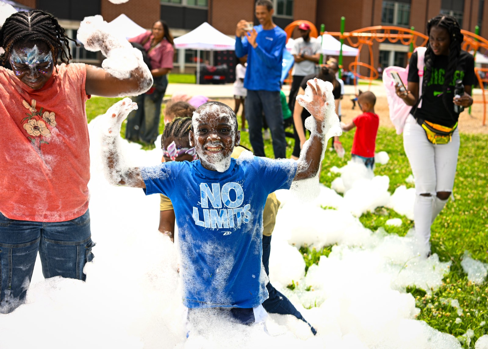 Kids covered in foam at the foam party at Turbo Day 2026