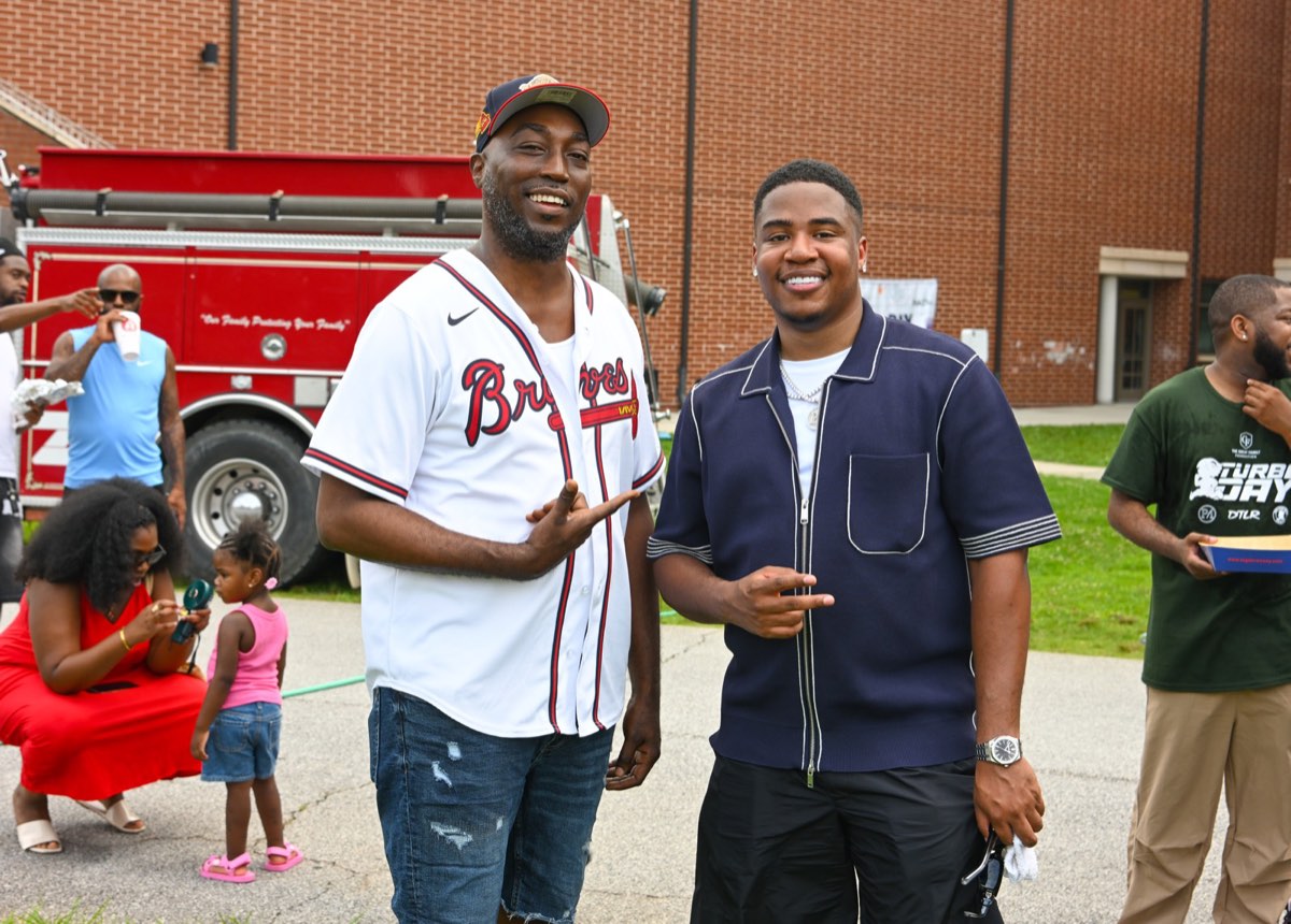 Turbo with his great friend Jamal by the fire truck at Turbo Day 2026